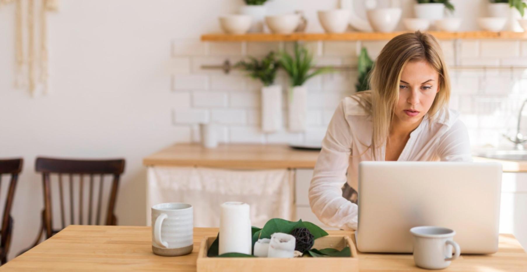 Group of diverse investors collaborating on financial analysis in modern learning space